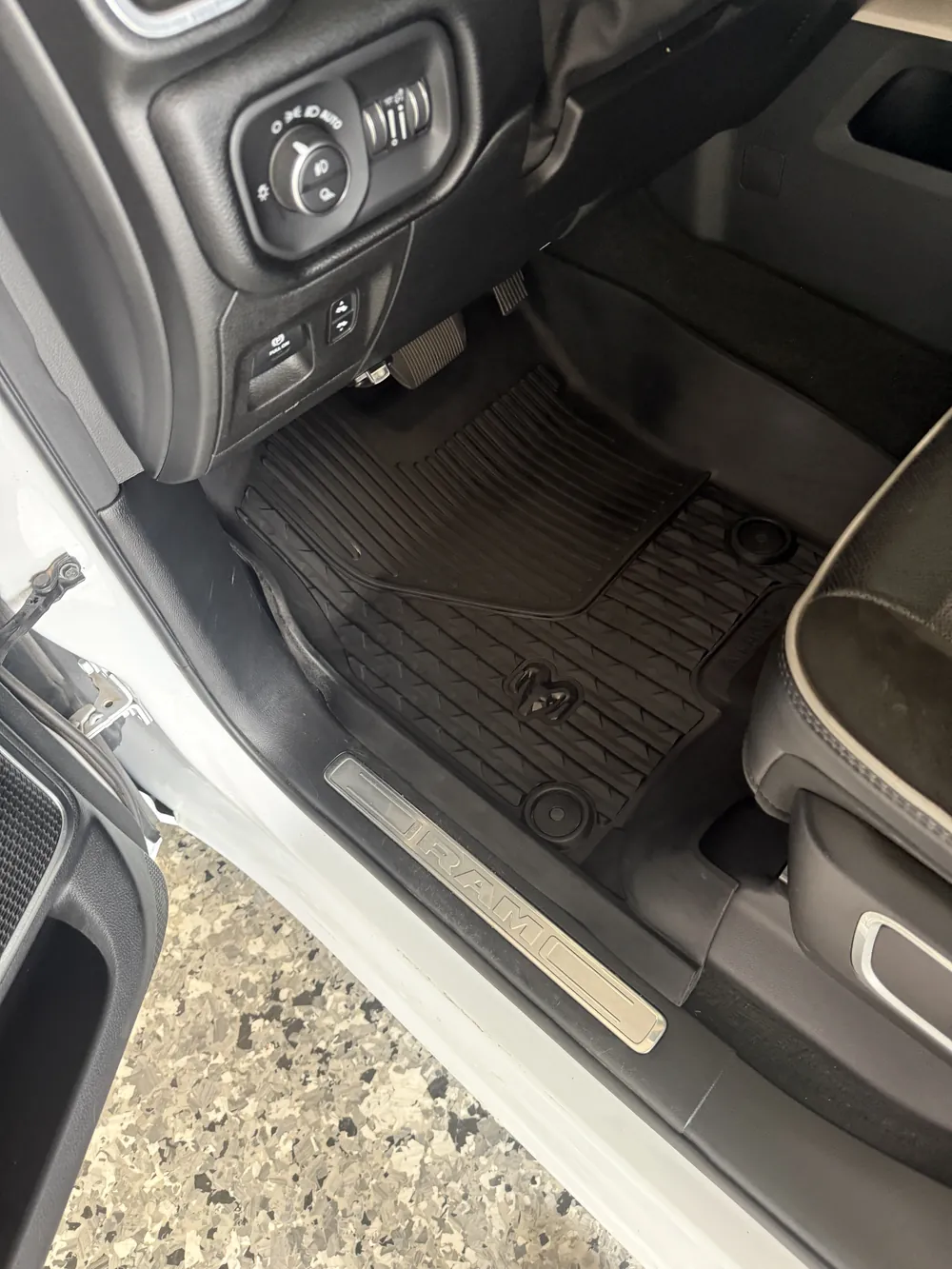 The same floor mat after — dirt lifted out of the rubber